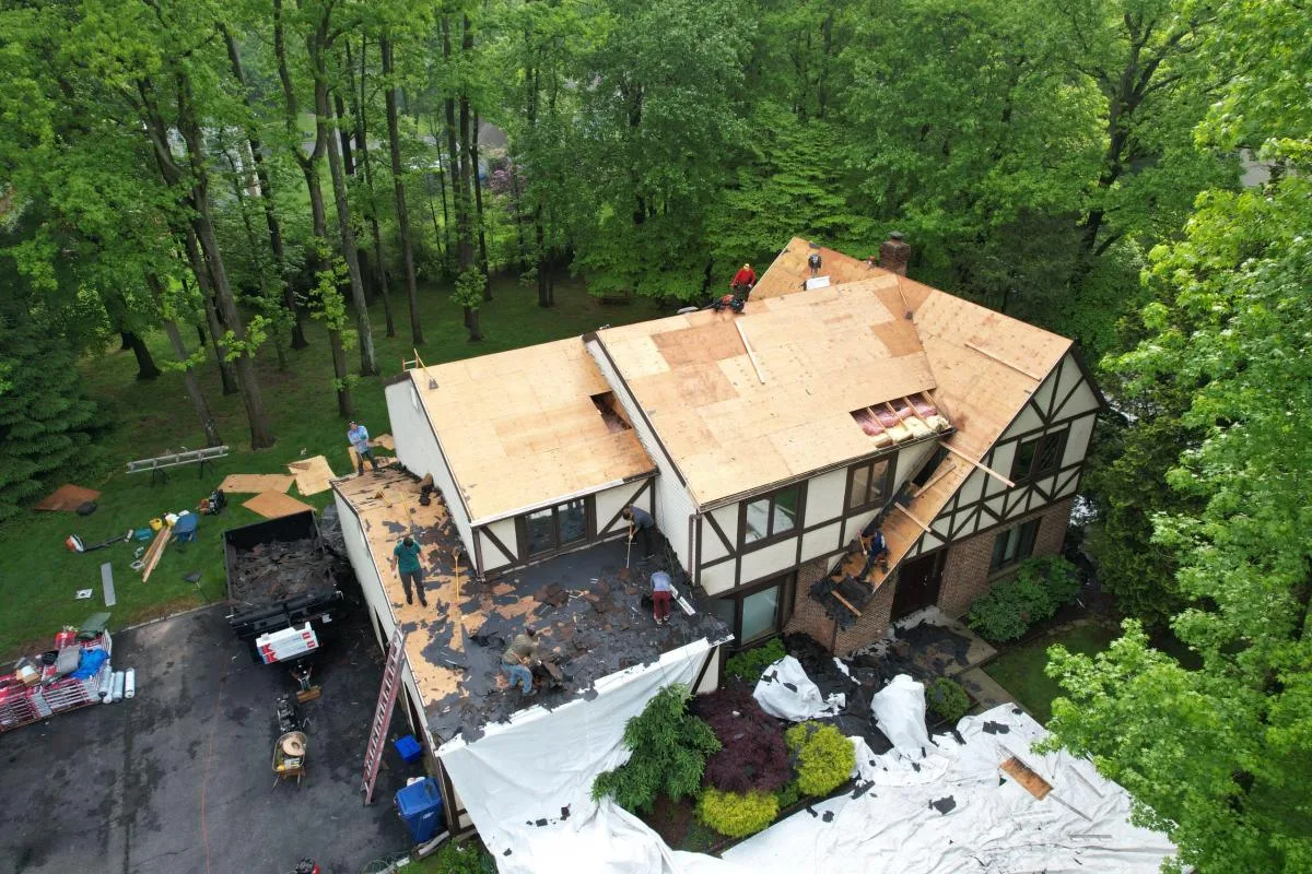 DGC Roof certified team working on a New Jersey roofing project